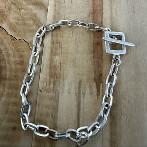 Silver tone toggle closure bracelet
